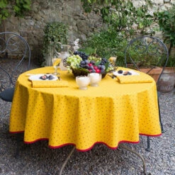 70" Round Calisson Yellow & Red Allover Acrylic-Coated Cotton Tablecloth By Tissus Toselli -Kitchen Textiles ramatuelle calisson yellow blue french coated cotton round tablecloth allover tissus toselli bsq